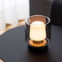 Zwarte glazen lamphouder van sackit met een warm oplichtende lamp op een donkere tafel voor sfeervolle binnenverlichting geïnspireerd op New Yorkse jazzbars