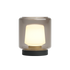Draadloze Ambience tafellamp van sackit met warme verlichting in een transparante kap en zwarte voet voor sfeervolle verlichting binnen en buiten