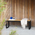 Patio Bench 130x37 van sackit in een buitenomgeving