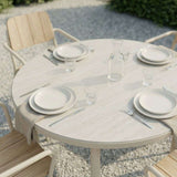 Kirra Dining Table Ø110 Ceramic & 4 Kirra Patio Chair van sackit in een buitenomgeving