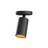 Zwarte cilindrische plafondlamp van sackit met een warme oranje lichtbron