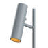 Grijze cilindrische tafellamp met verstelbare arm en warme oranje lichtbron minimalistisch ontwerp van sackit voor een modern interieur
