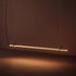Ease 180 hanglamp boven de eettafel in brons van sackit gestyled in een interieur