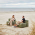 Soft Sofa Outdoor Seat in Kirra Olive van sackit buiten bij natuurlijk licht