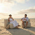 Soft Sofa Outdoor Seat in Boucle Beige van sackit buiten bij natuurlijk licht