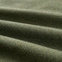 Close up van de olijfgroene geweven bekleding van de sackit Cobana Pouf voor binnen en buiten dankzij het weerbestendige materiaal