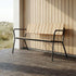 Kirra Patio Bench in Noir van sackit op een terras