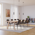 sackit eetkamerstoelen rond een lichte houten eettafel in een Scandinavisch interieur met vloerkleed en boekenkast