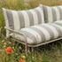Mollis Lounge Sofa 2 Seater in Renesse Taupe van sackit in een ontspannen loungehoek buiten