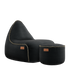 Zwarte canvas loungestoel met bijpassende poef van sackit voor comfortabel binnen zitten in een modern interieur