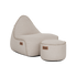 Lichtbeige lounge stoel met bijpassende poef van sackit voor comfortabel ontspannen binnen en buiten, met stevige bekleding en contrasterende stiknaden