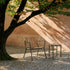Kirra Patio Lounge Chair in olijfgroen van sackit op een terras