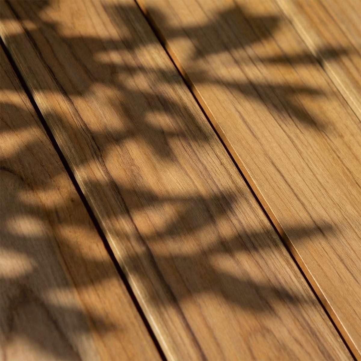 Close-up van het materiaal van Kirra Café Table in Chestnut van sackit