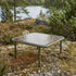 Mollis Coffee Table in olijfgroen van sackit in een buitenomgeving